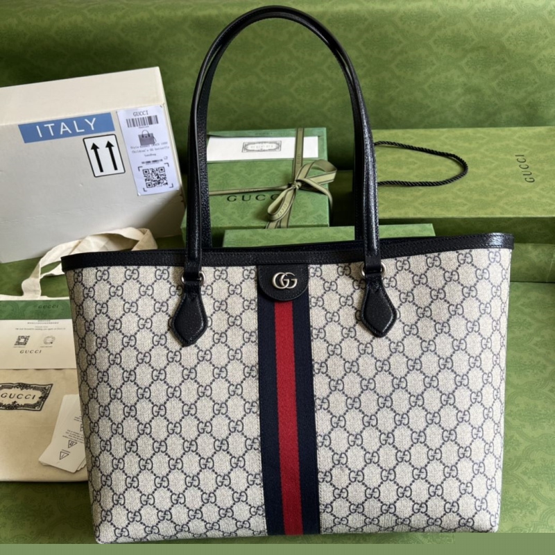 G*u*i shopping bags